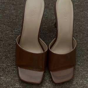 Brown patent heel